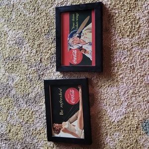 Framed coca cola pictures